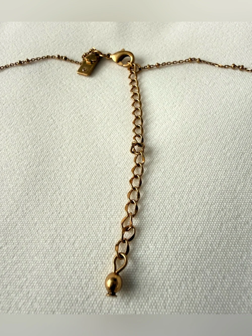 Kate Spade Gold Tone Imitation Pearl Charm Necklace